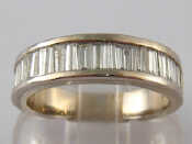 Appraisal: A white metal tests carat gold baguette cut diamond ring