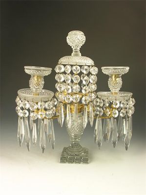 Appraisal: A Regency cut glass and ormolu two branch candelabra hung