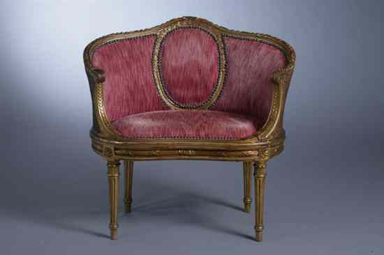 Appraisal: LOUIS XVI STYLE CARVED AND GILT-WOOD UPHOLSTERED BOUDOIR ARMCHAIR circa