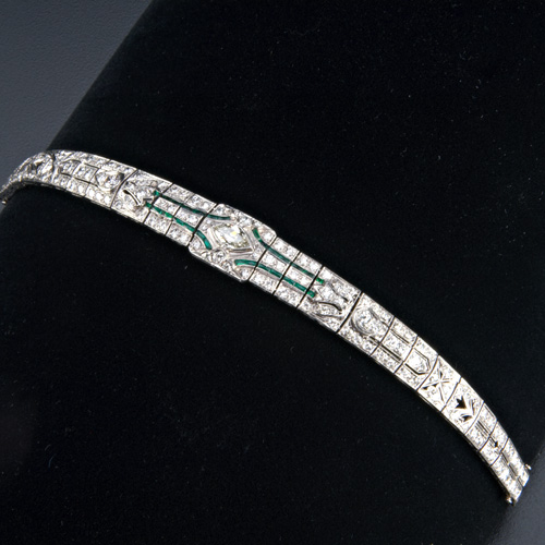 Appraisal: Art Deco diamond strap bracelet in pt with CC emeralds