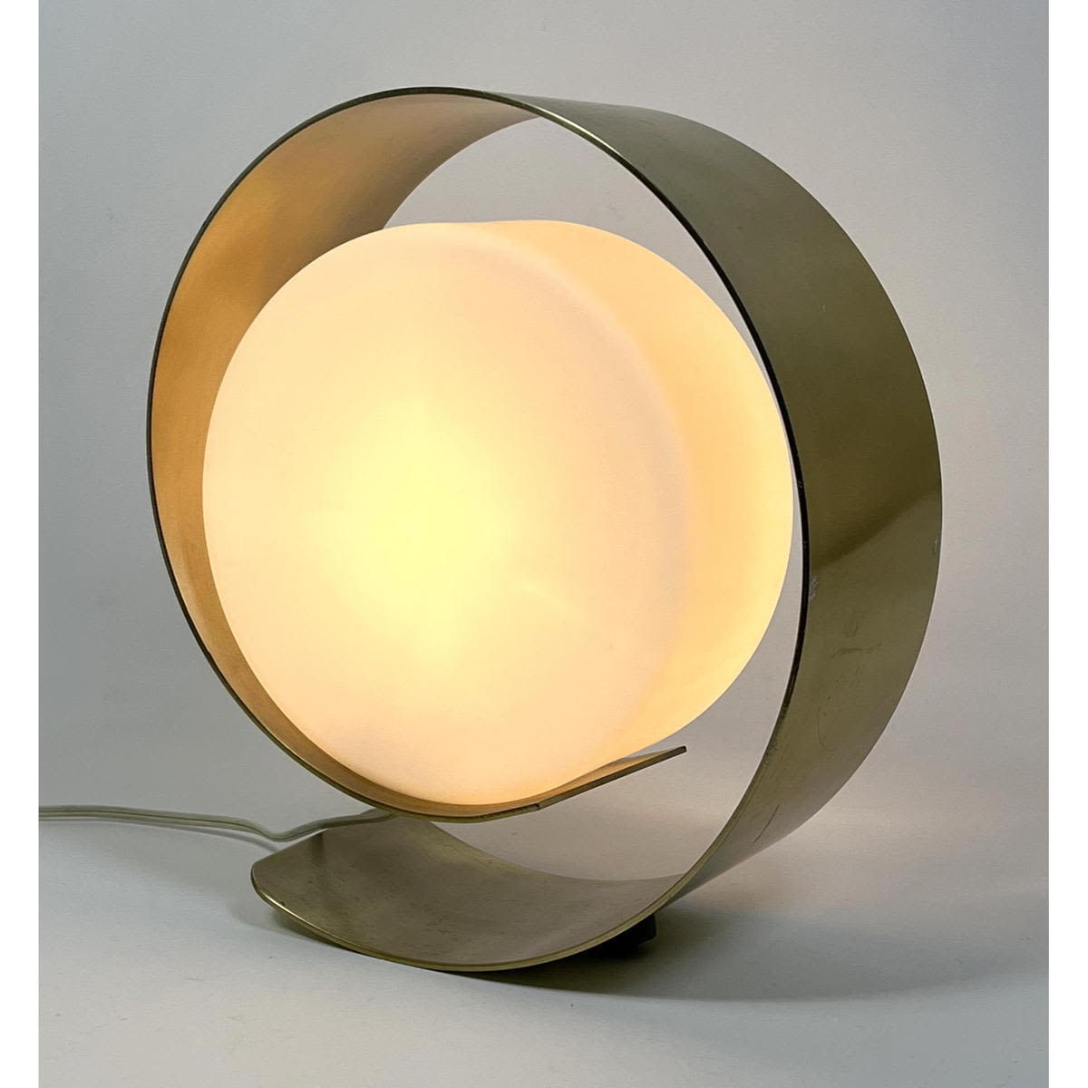 Appraisal: PIERRE CARDIN 's Modernist Table Lamp Curved Metal Form supports