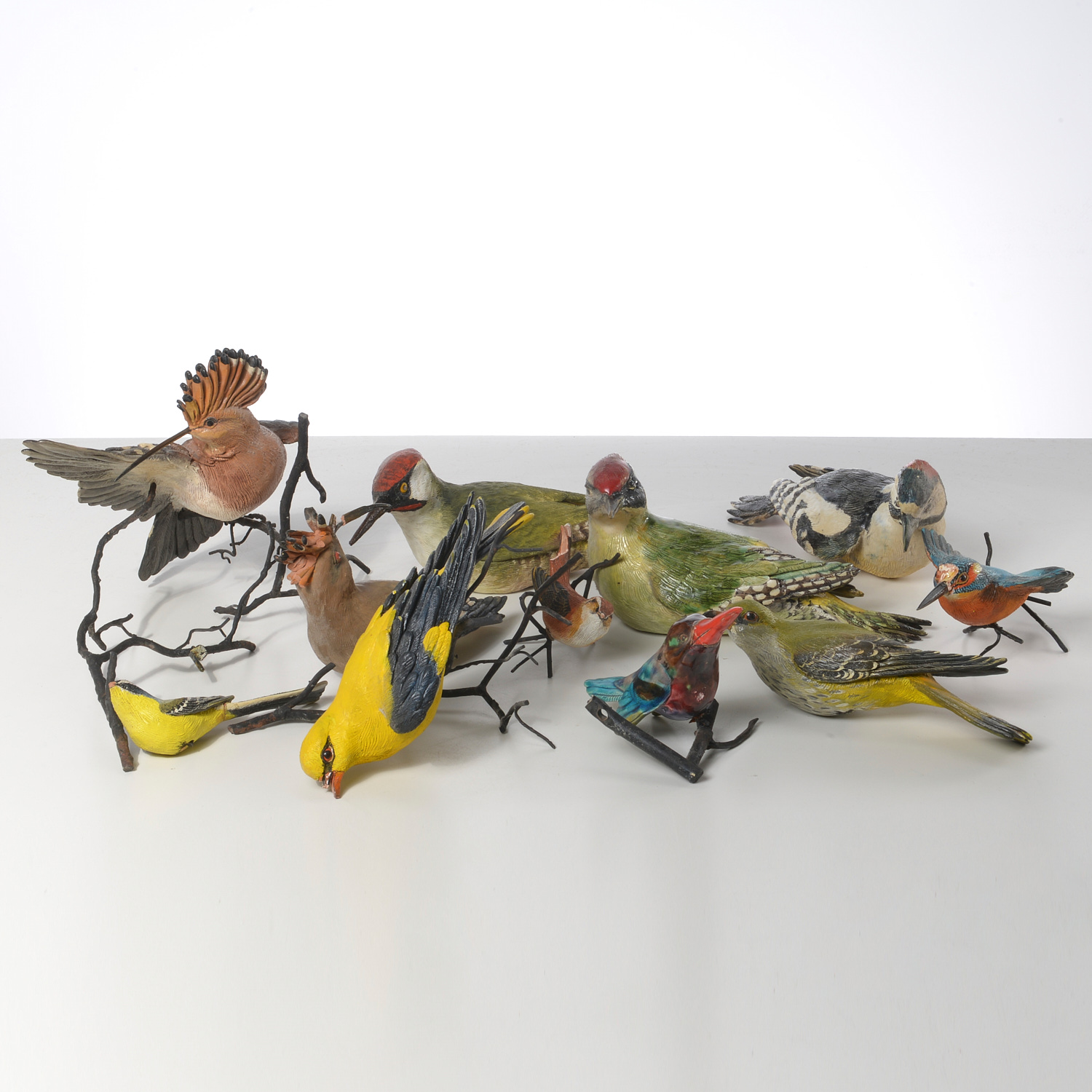 Appraisal: COLLECTION HAND-PAINTED CERAMIC BIRDS th c pieces incl terracotta plaster