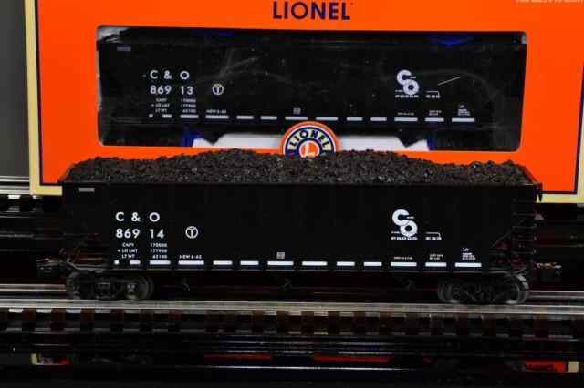 Appraisal: LIONEL HOPPERSIncluding four similar C O cars two -bay hoppers