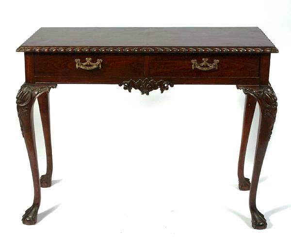 Appraisal: A Chippendale style mixed wood two drawer console table height