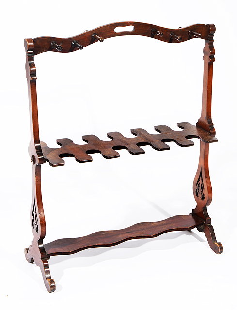 Appraisal: A VICTORIAN MAHOGANY BOOT RACK with hooks set in a