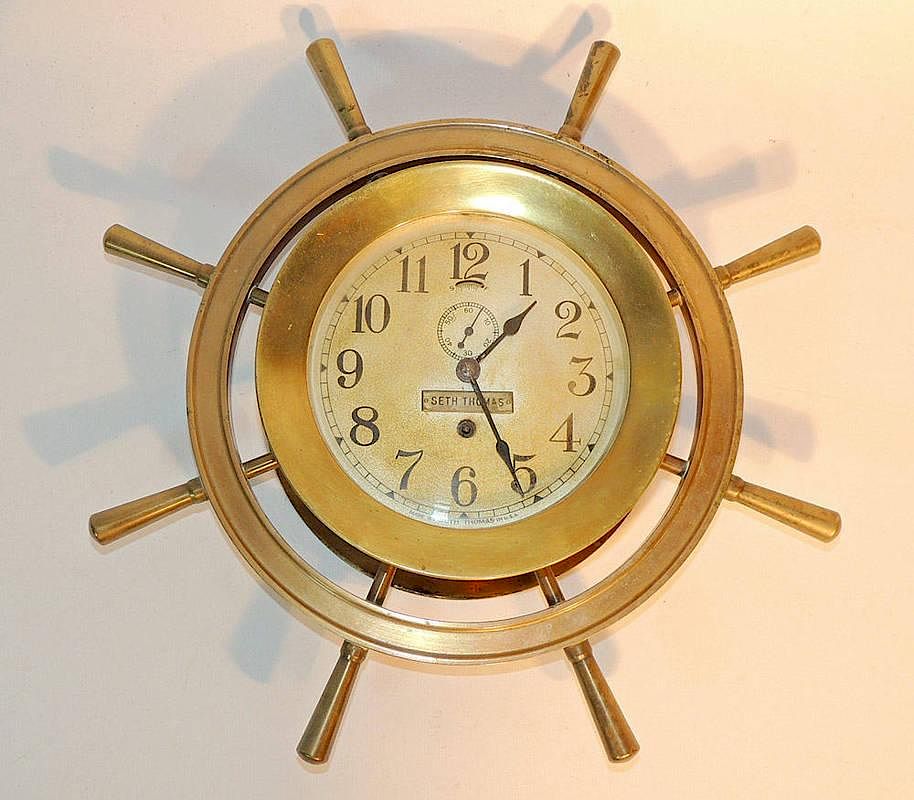 Appraisal: Seth Thomas Ship's Clock Brass with circular wheel surround -