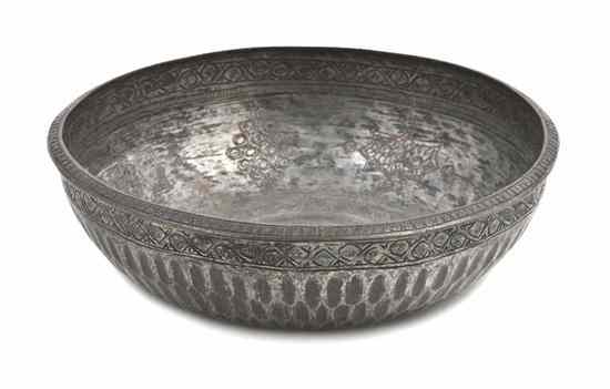 Appraisal: A Middle Eastern Silvered Metal Bowl of circular form with