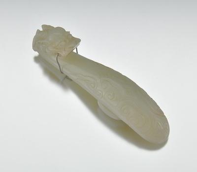 Appraisal: A Carved Jade Belt Hook Chinese Traditional form carved wtih