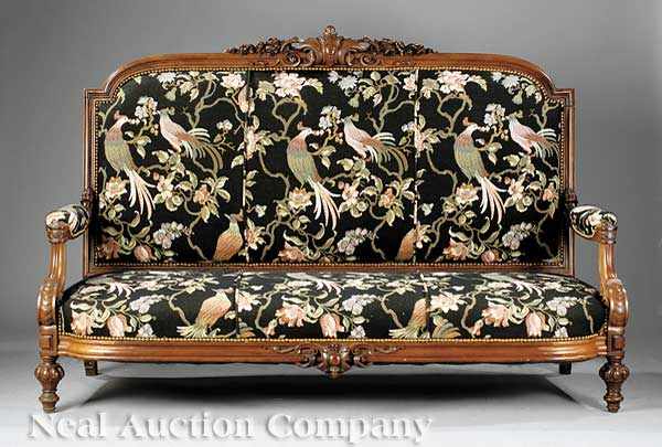 Appraisal: An American Renaissance Carved Rosewood Settee c arched molded crest