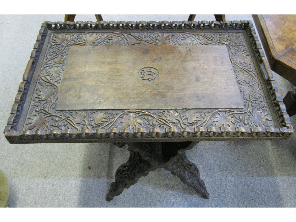 Appraisal: Carved hardwood tray on folding stand