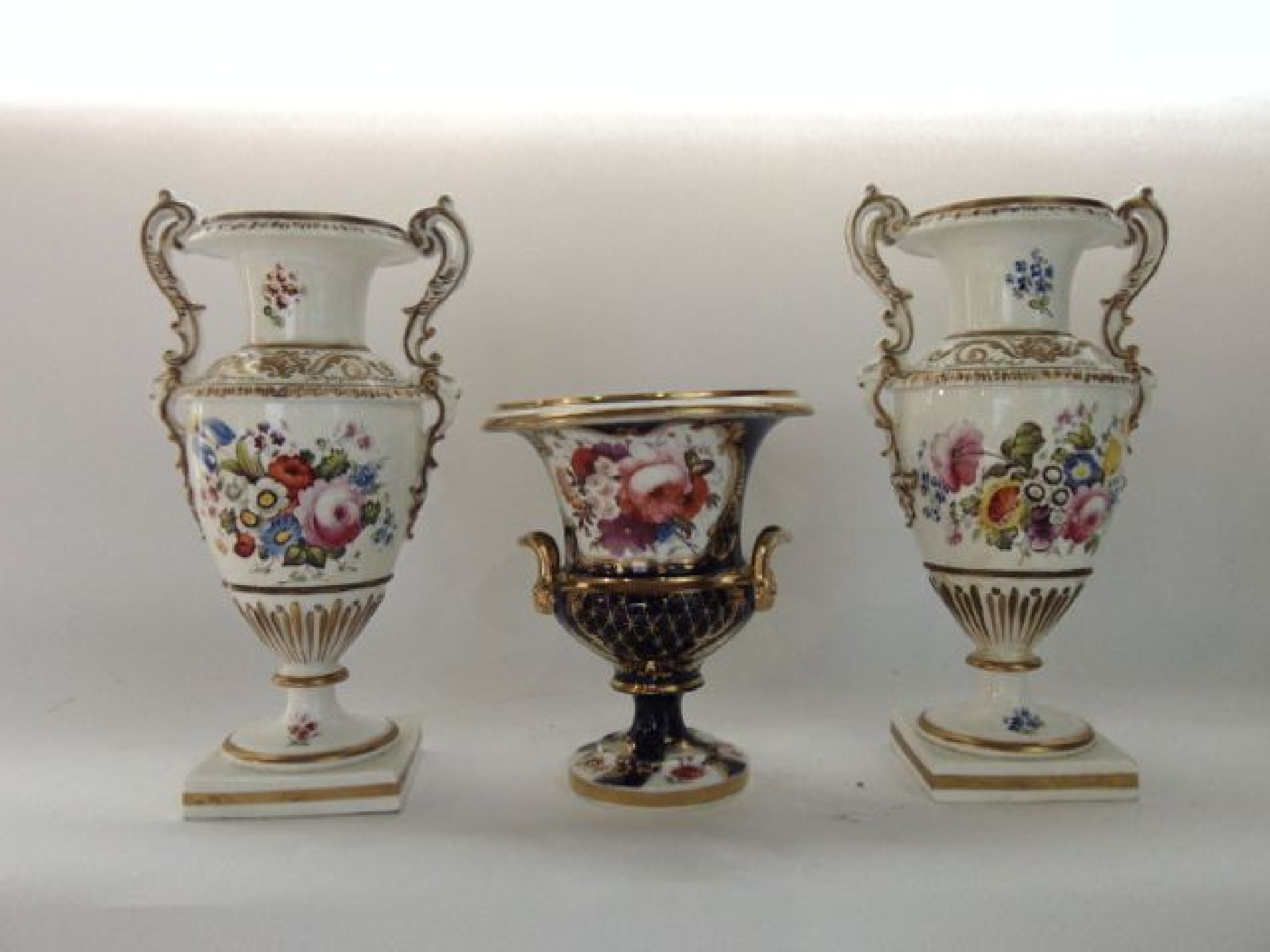 Appraisal: A pair of th century two handled vases with painted