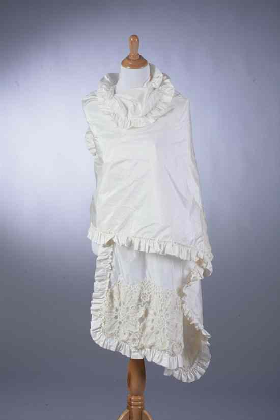 Appraisal: CREAM TAFFETA EVENING WRAP With ruffle trim and crocheted embellishment