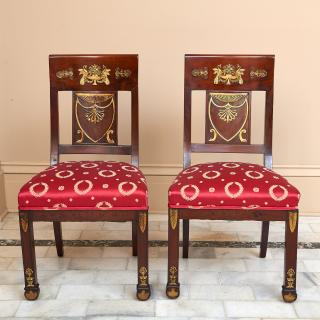 Appraisal: Pair Restauration bronze mounted mahogany chaises Pair Restauration bronze mounted