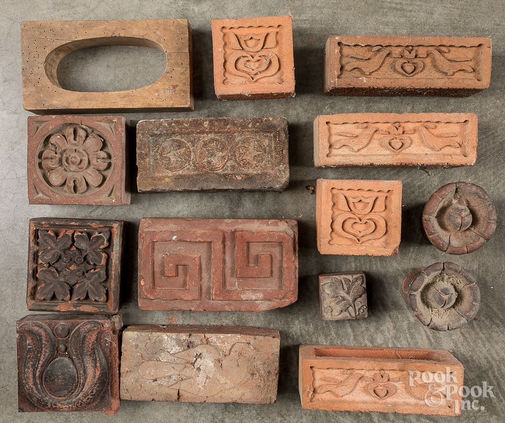 Appraisal: Group of decorative architectural bricks Group of decorative architectural bricks