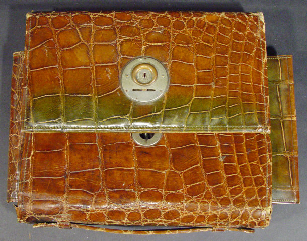 Appraisal: Art Deco crocodile skin vanity case the lockable clasp enclosing