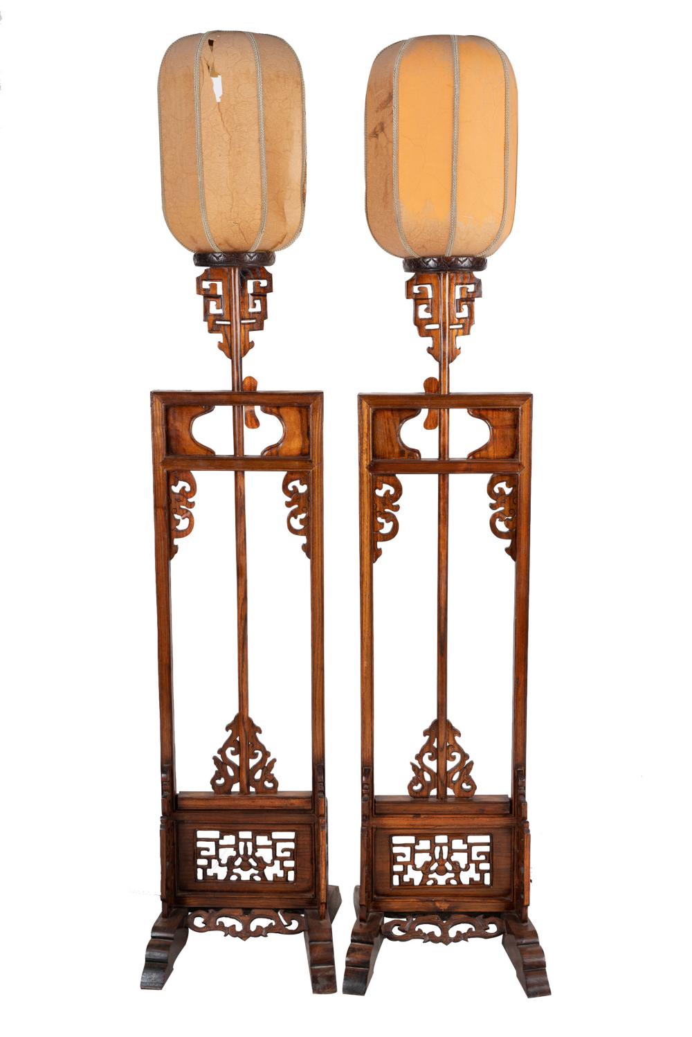 Appraisal: PAIR OF CHINESE CARVED WOOD LANTERNSwith paper shades electrified Condition