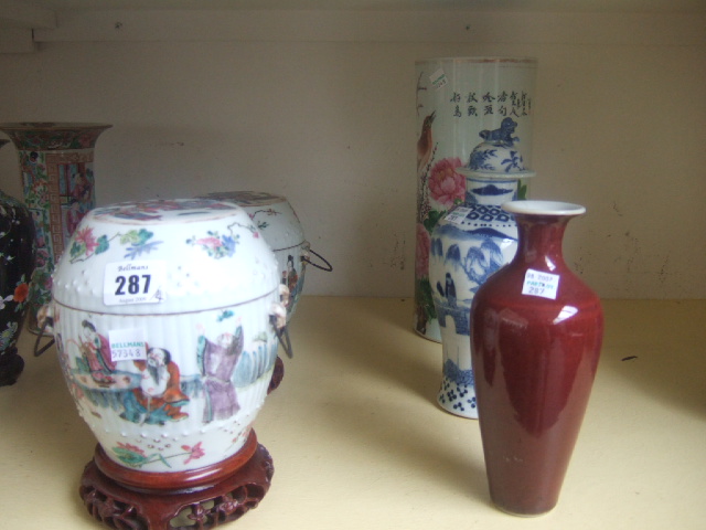 Appraisal: A pair of 'famille-rose' two-handled food jars and covers Qing