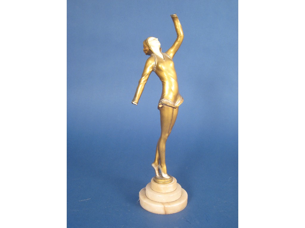 Appraisal: A painted bronze Art Deco figure of a Dancer carved