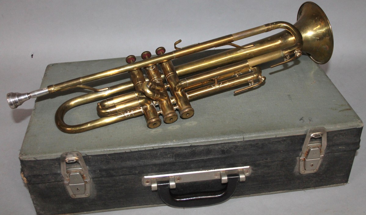 Appraisal: A B M Champion brass trumpet set with three buttons