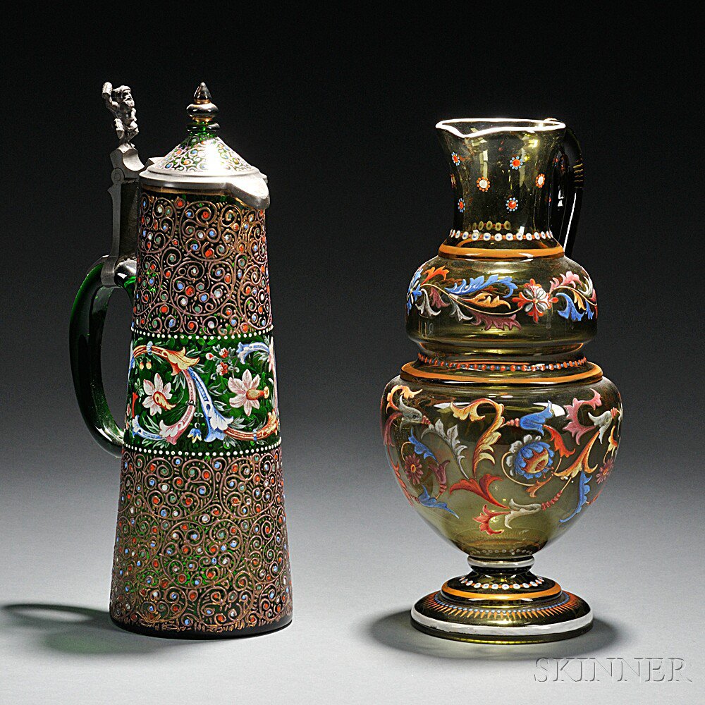 Appraisal: Two Enameled and Gilded Green Glass Ewers probably Bohemia late