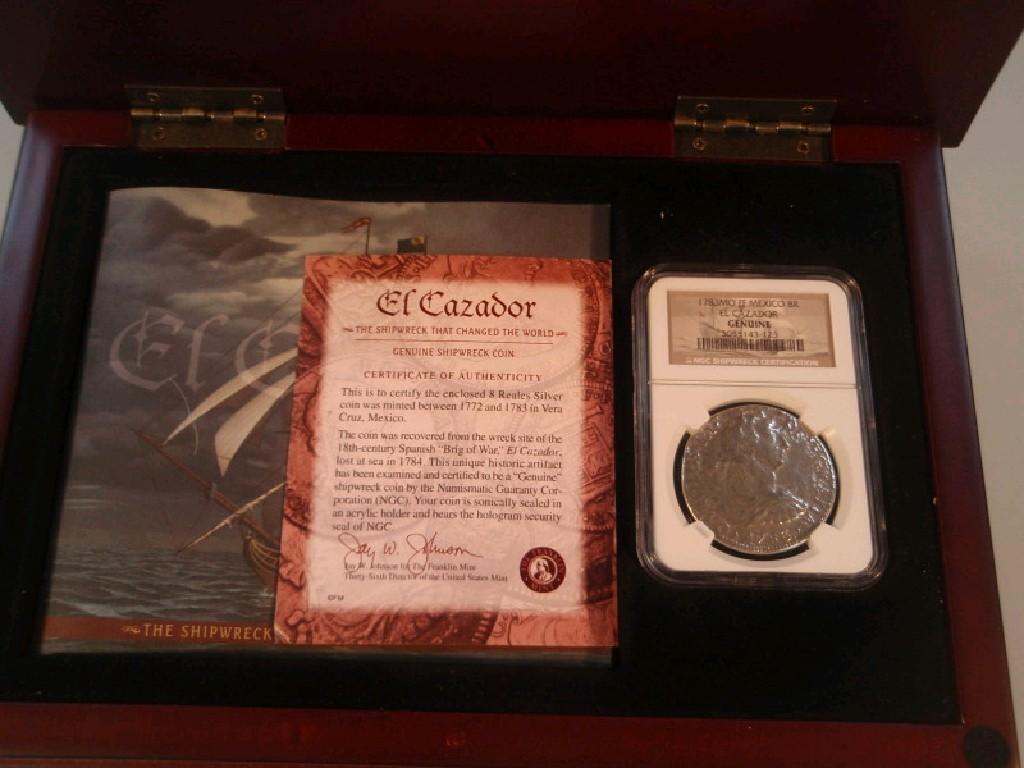 Appraisal: An eight Reales silver coin from the shipwreck L Cazador