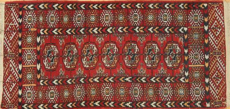 Appraisal: TWO PAKISTANI TURCOMAN RUGS The one worked with a line