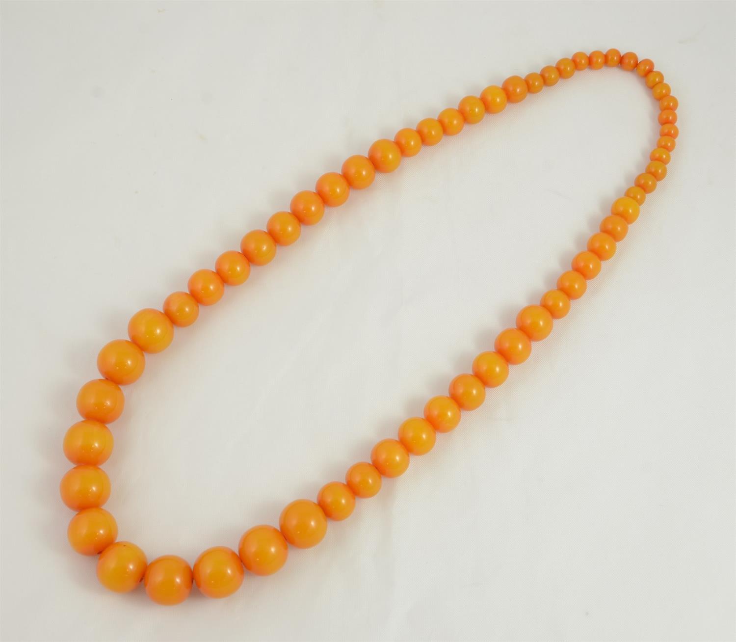 Appraisal: Butterscotch resin graduated beaded necklace long