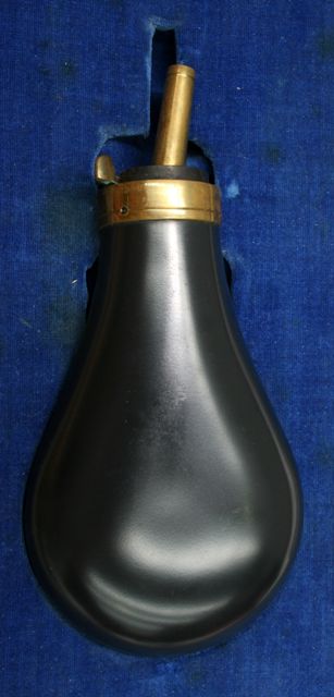 Appraisal: A Colt navy powder flask new in presentation box