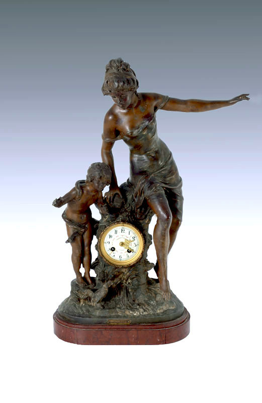 Appraisal: SAMUEL MARTI FRENCH FIGURAL MANTLE CLOCK Patinated spelter figure of