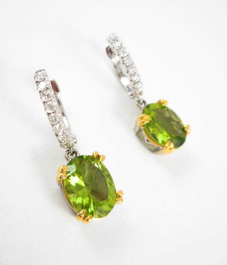 Appraisal: PAIR OF PERIDOT AND DIAMOND DANGLE EARRINGS each k white