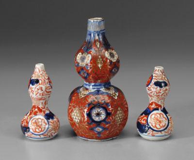 Appraisal: Japanese imari double-gourd vases one hexagonal with flowers and Buddhist