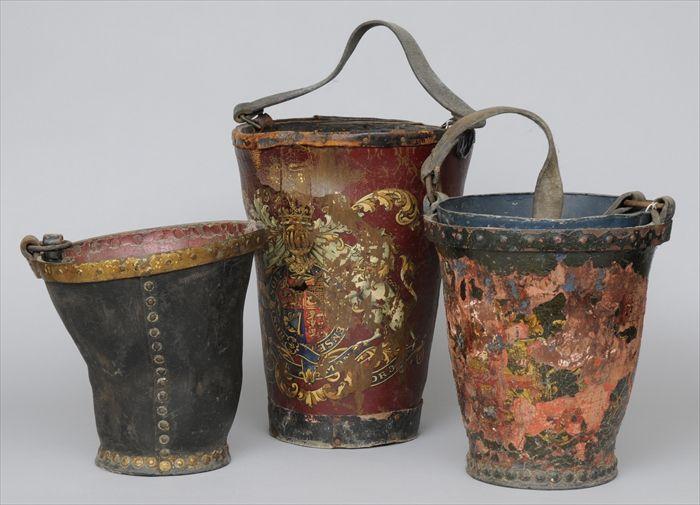 Appraisal: THREE PAINTED LEATHER FIRE BUCKETS to in