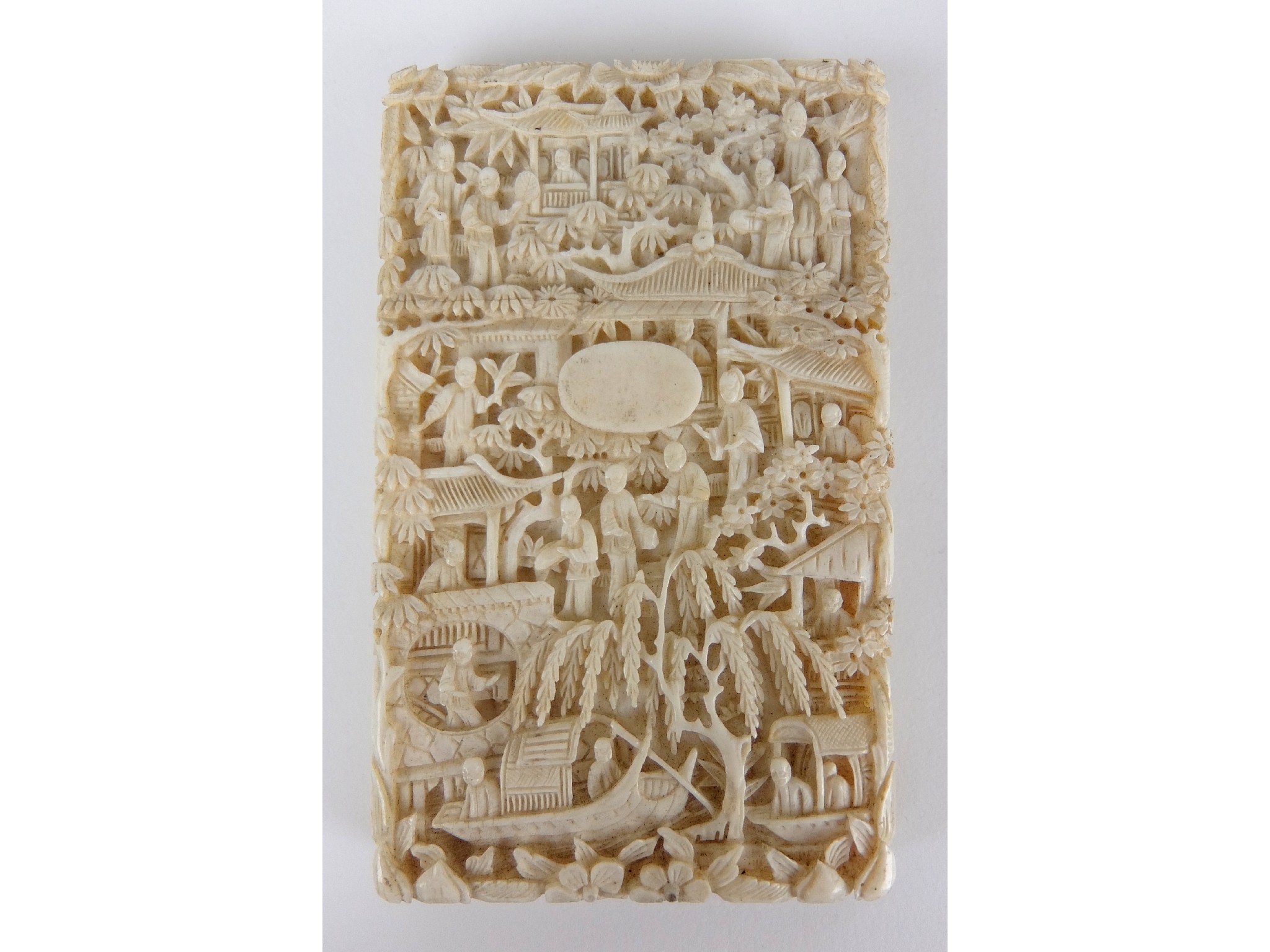 Appraisal: A Cantonese ivory card casecarved allover with figures in sampans