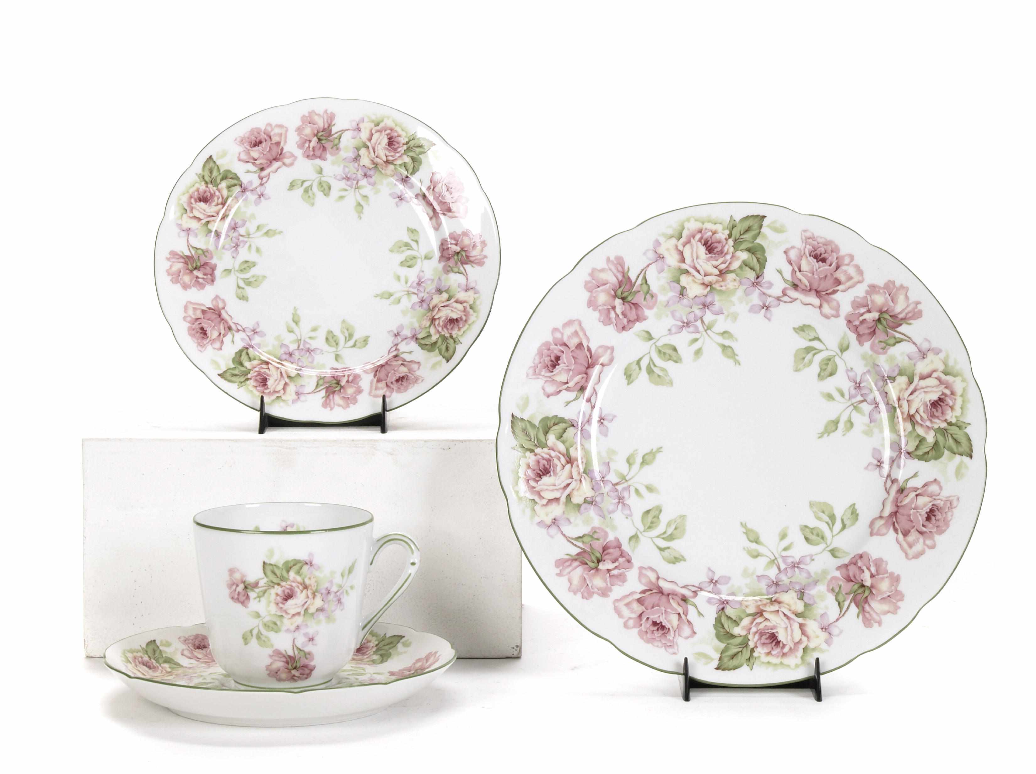 Appraisal: A Bernaud Limoges part dinner service in the Eugenie Day