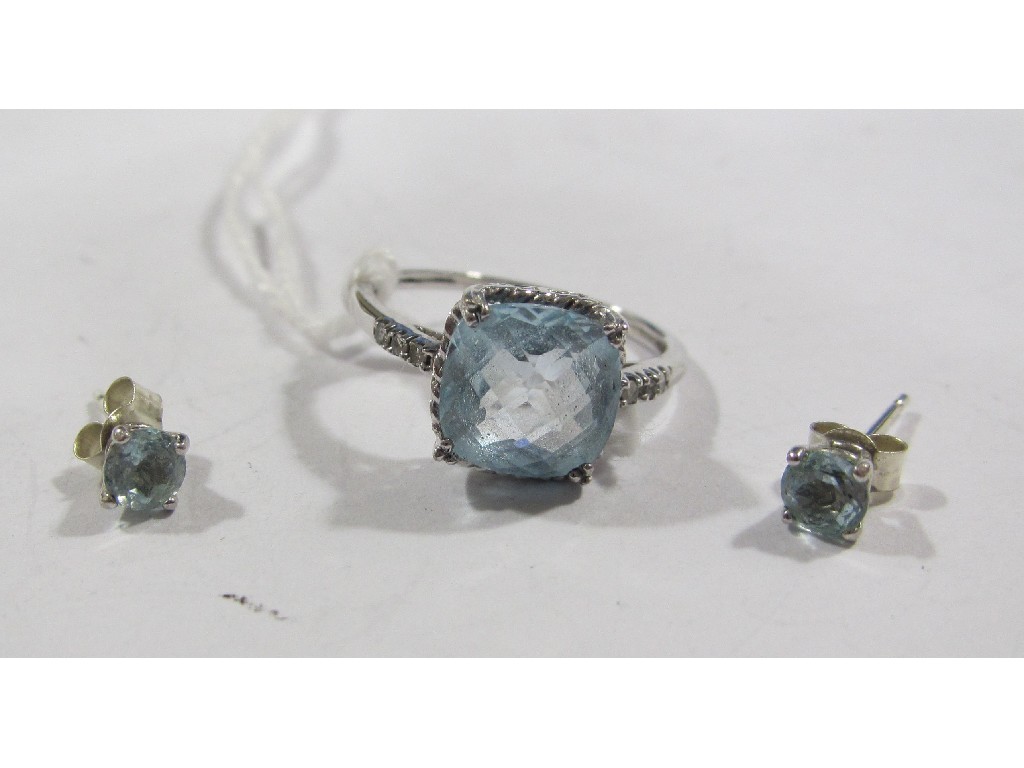 Appraisal: White gold blue topaz single stone ring with diamond shoulders