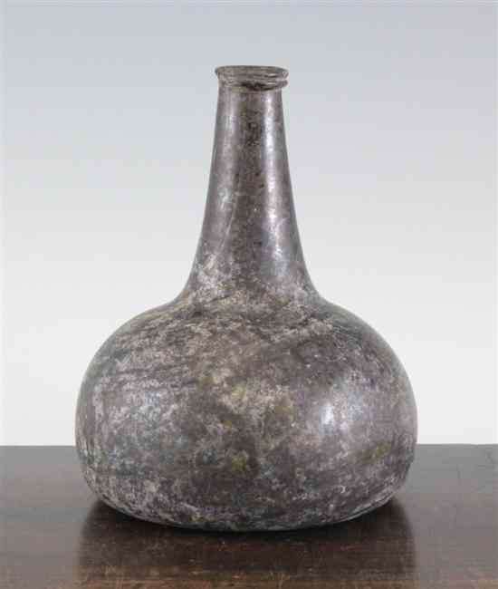 Appraisal: An excavated English globe and shaft wine bottle early th