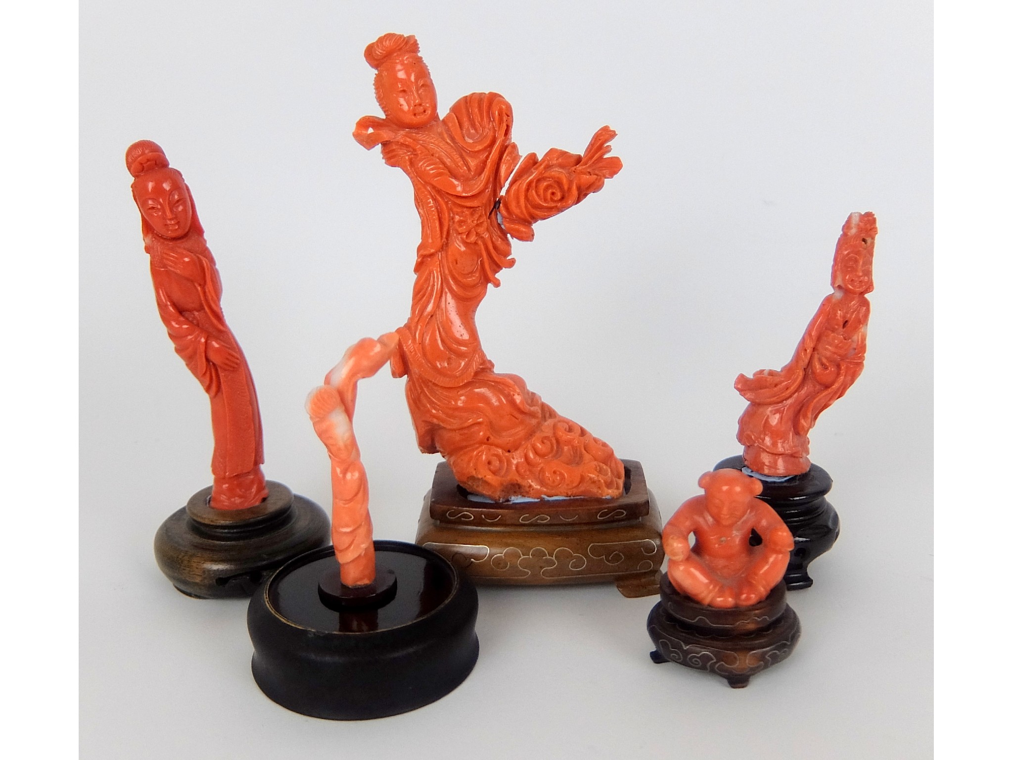 Appraisal: Five Chinese coral carvingscomprising four female figures and a seated