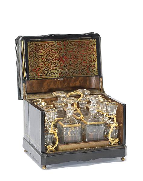 Appraisal: A Napoleon III boulle marquetry and red tortoiseshell cave a