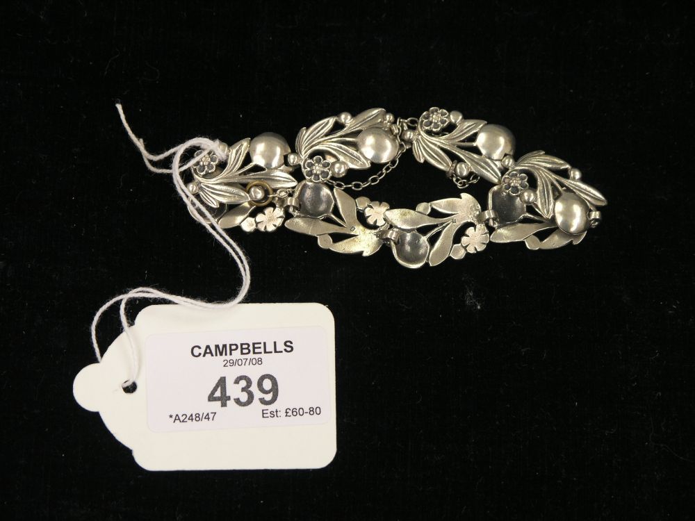 Appraisal: A silver bracelet cast in the form of flowers and