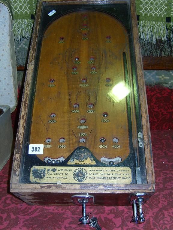 Appraisal: An early th century bagatelle game in wooden casing