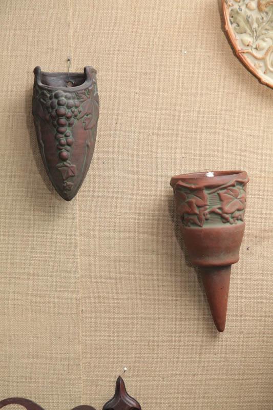 Appraisal: TWO WELLER WALL POCKETS Both of conical form and signed