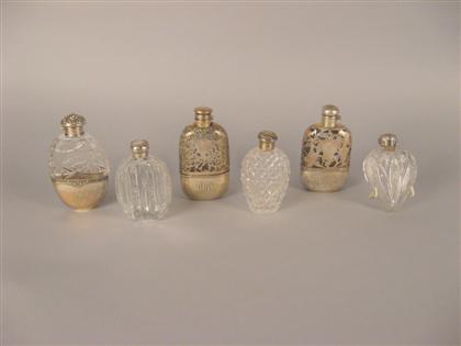 Appraisal: Six American sterling silver mounted cut glass flasks Comprising a