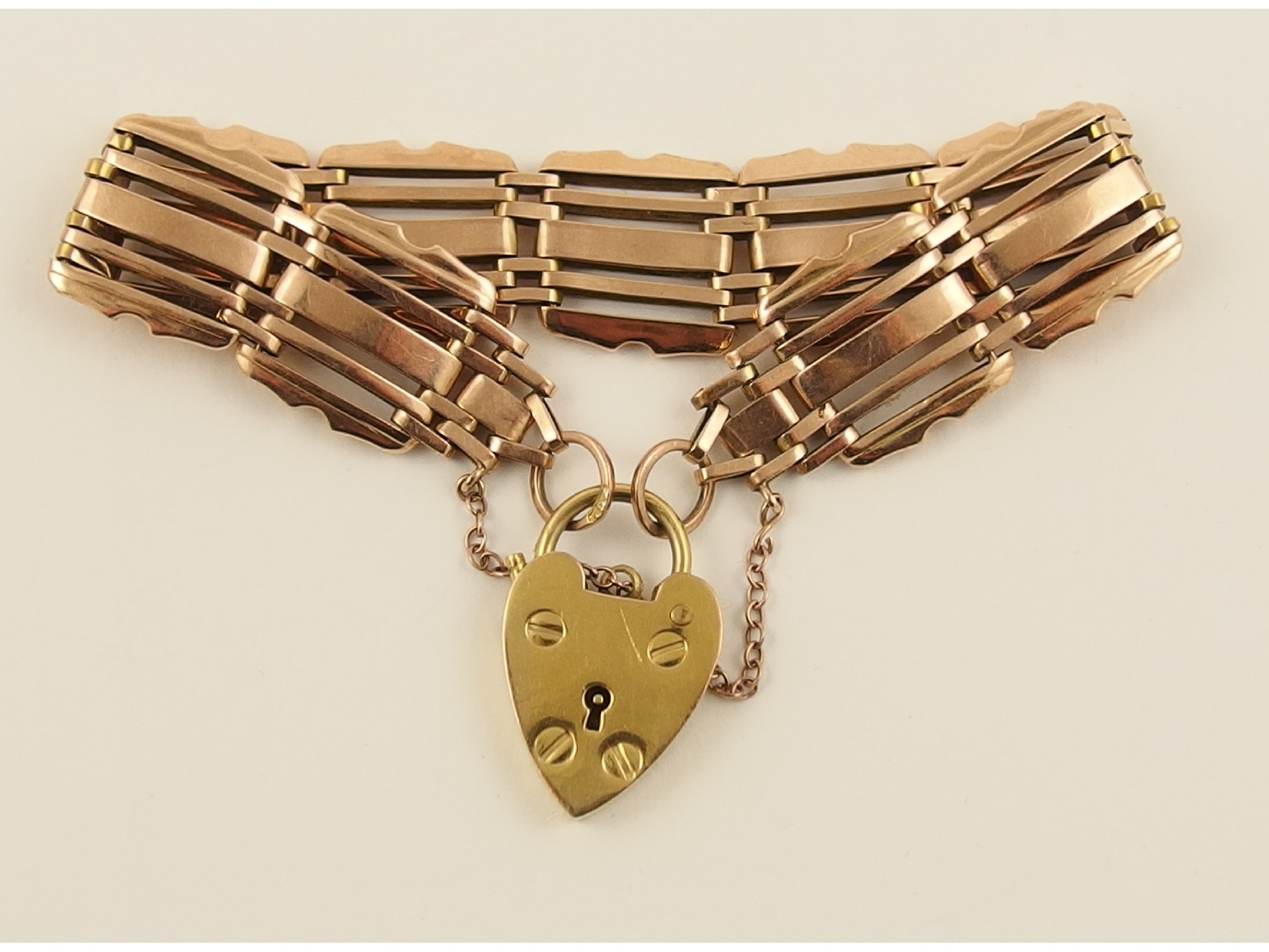 Appraisal: An Edwardian ct rose gold gate braceletwith unusual decorative links