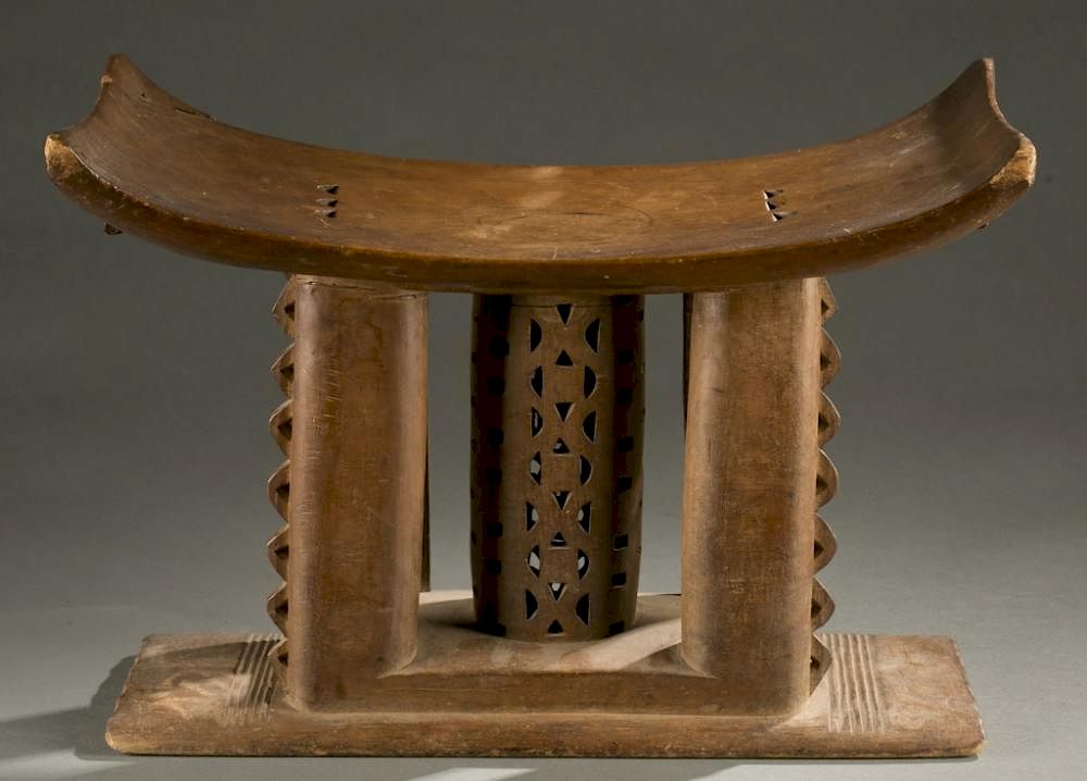 Appraisal: Asante stool with curved seat th century A stool with