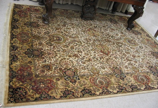 Appraisal: HAND KNOTTED ORIENTAL CARPET Indo-Persian overall scrolling floral raceme decoration