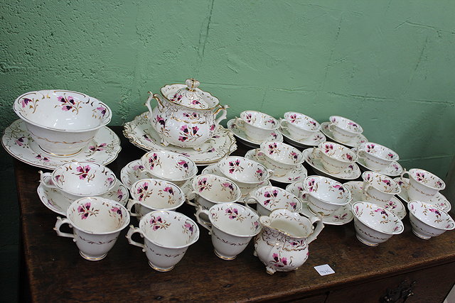 Appraisal: A VICTORIAN PART CHINA TEASET with scrolling gilt floral decoration