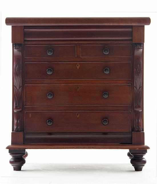 Appraisal: English carved mahogany miniature chest of drawers late th century