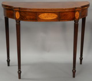 Appraisal: Sheraton mahogany games table having D shaped top over conforming