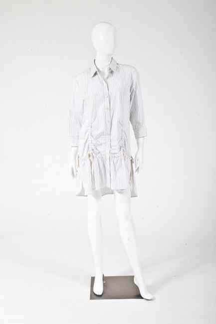 Appraisal: THREE PIECES DESIGNER CLOTHING Including Louis Vuitton cotton tunic blouse