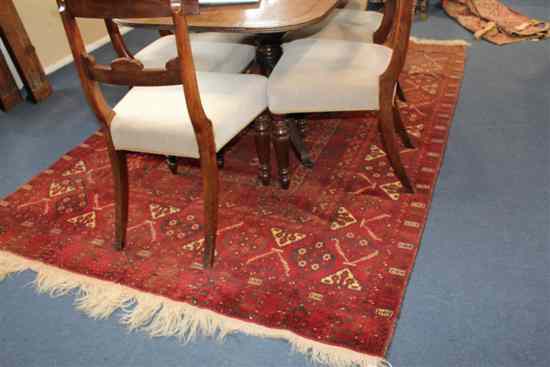 Appraisal: A Turkoman rug with central field of rectangular and geometric